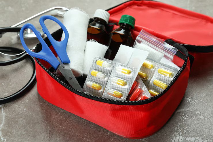 red color first-aid bag for travel purpose
