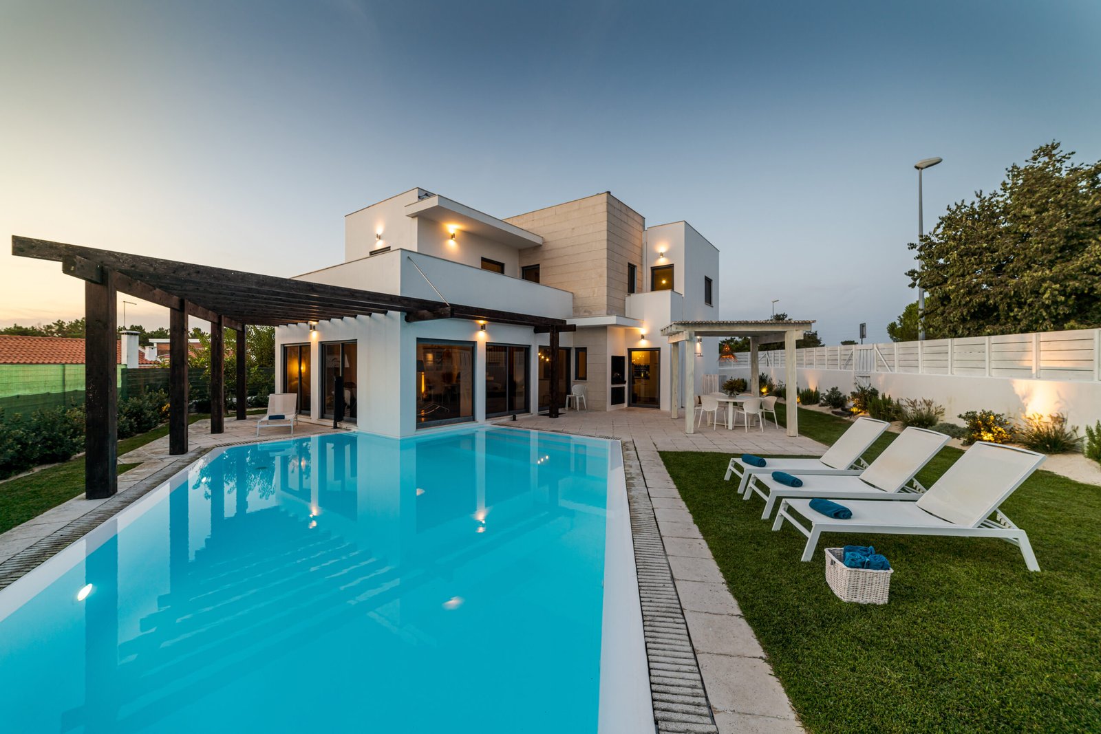 modern house with garden and swimming - About Caelum